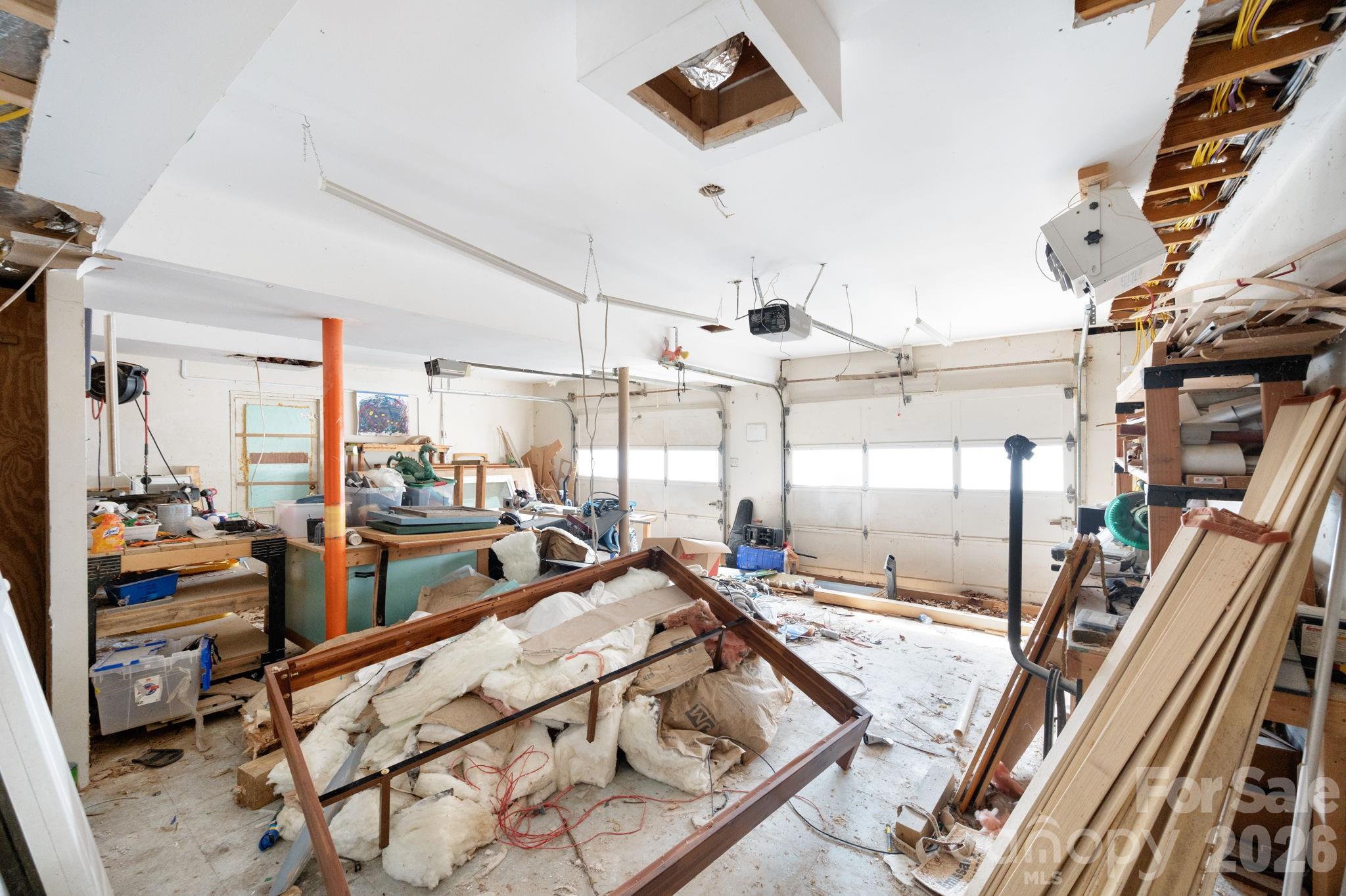 59 Faircrest Road Asheville, NC 28804 - Photo 17 of 24 a view of a room with gym equipment