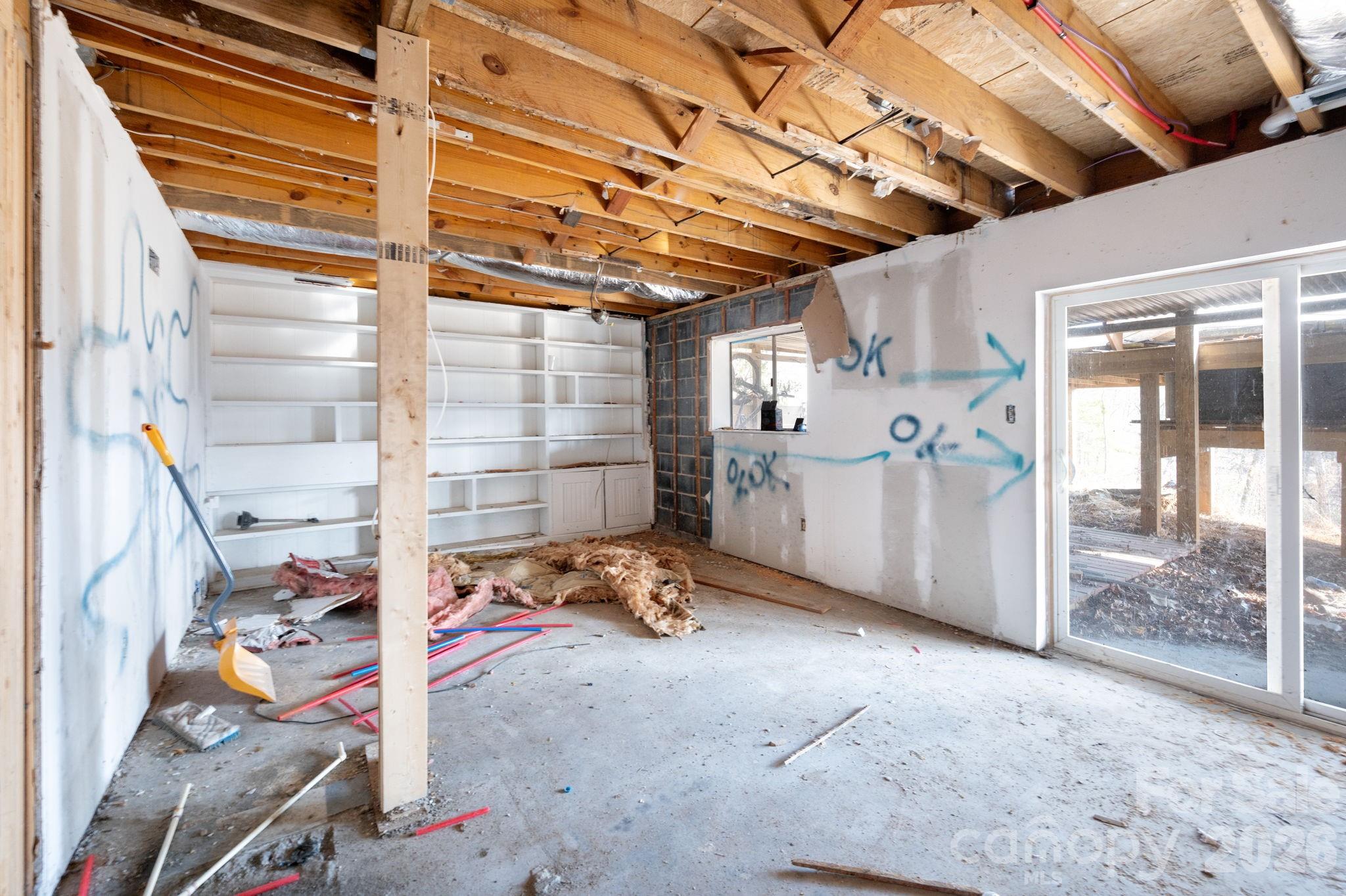 59 Faircrest Road Asheville, NC 28804 - Photo 18 of 24 a view of a room with gym equipment