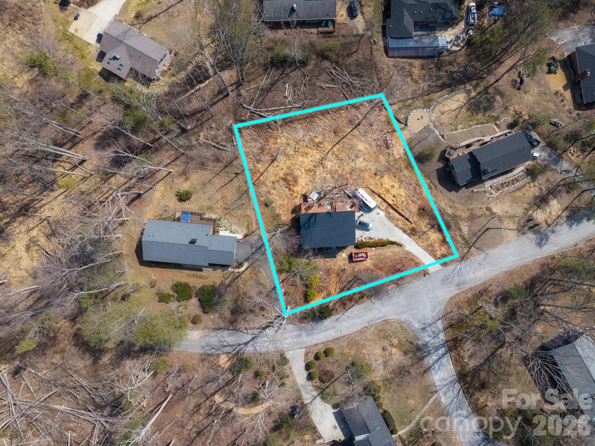 59 Faircrest Road Asheville, NC 28804 - Photo 19 of 24 an aerial view of a house a yard and mountain view