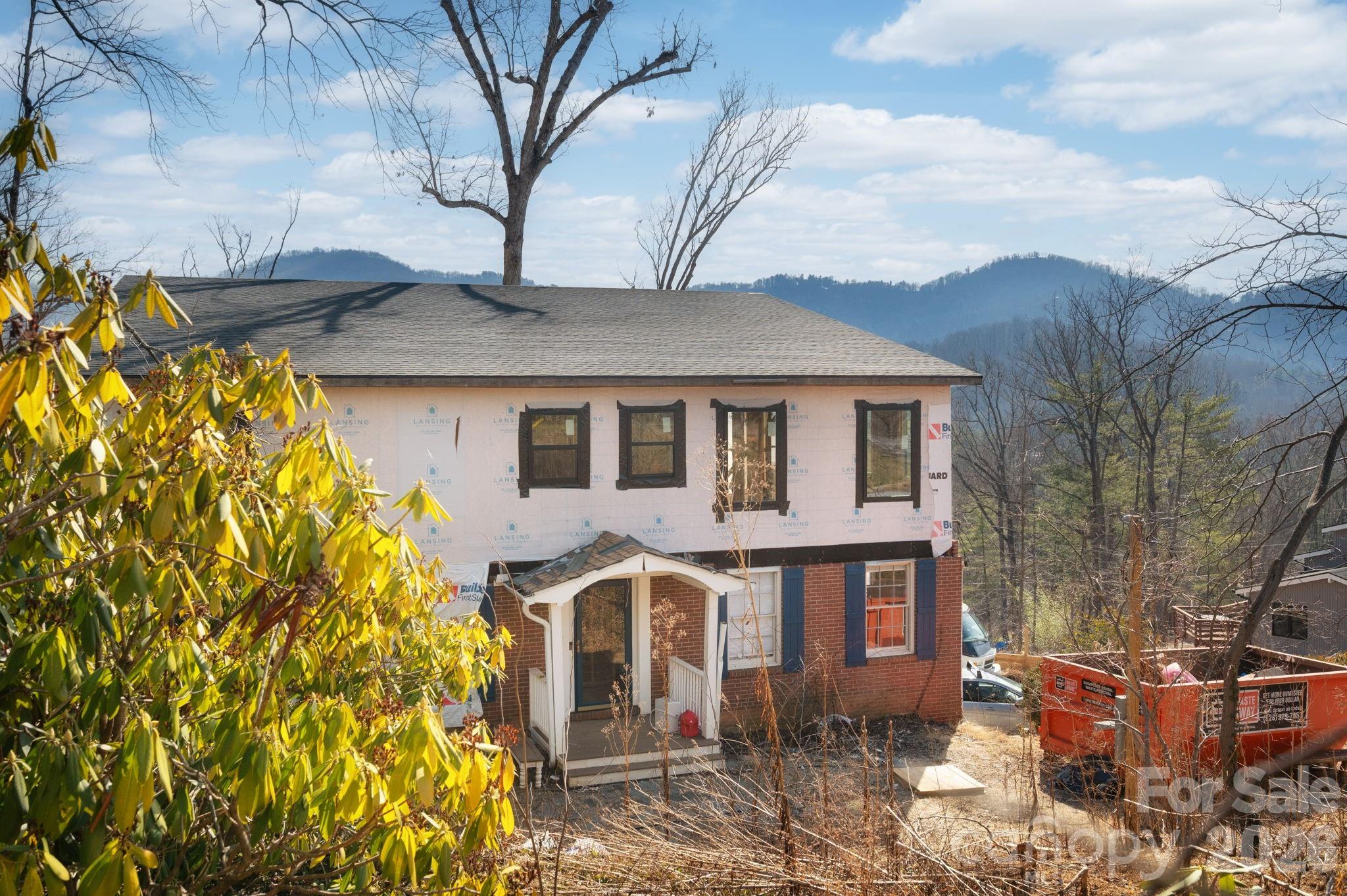59 Faircrest Road Asheville, NC 28804 - Photo 2 of 24 a front view of a house with garden