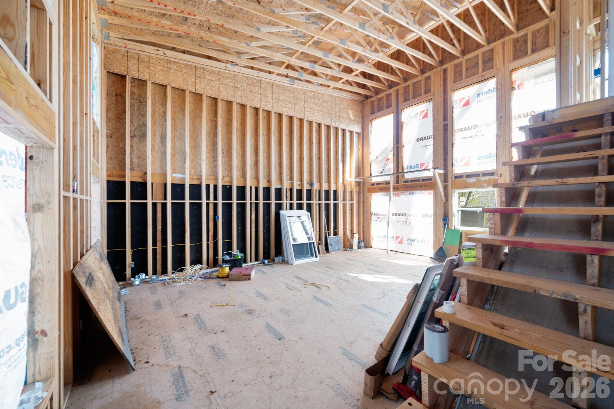 59 Faircrest Road Asheville, NC 28804 - Photo 10 of 24 a view of a bedroom with balcony and stairs
