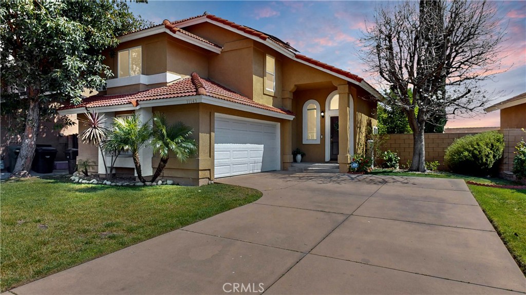 11143 Shaw Street Rancho Cucamonga, CA 91701 - Photo 1 of 1 a view of a house with a yard