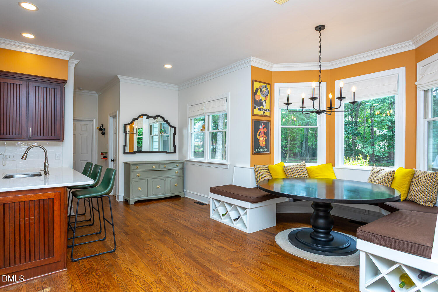 8509 Towneley Place Raleigh, NC 27615 - Photo 10 of 36 a living room with furniture a rug and a floor to ceiling window