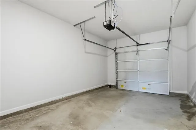 a view of storage and utility room with empty racks