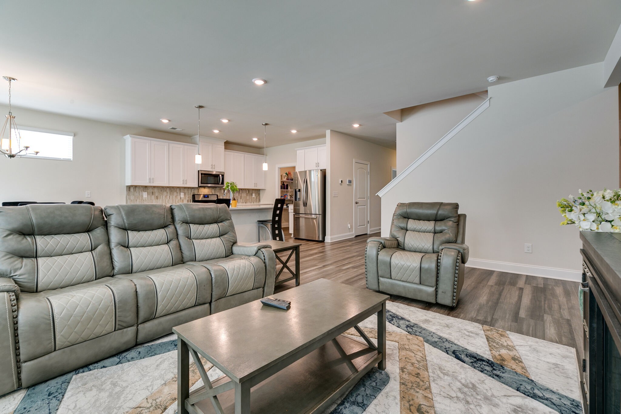 3264 Longstalk Road Antioch, TN 37013 - Photo 16 of 49 a living room with furniture and a wooden floor