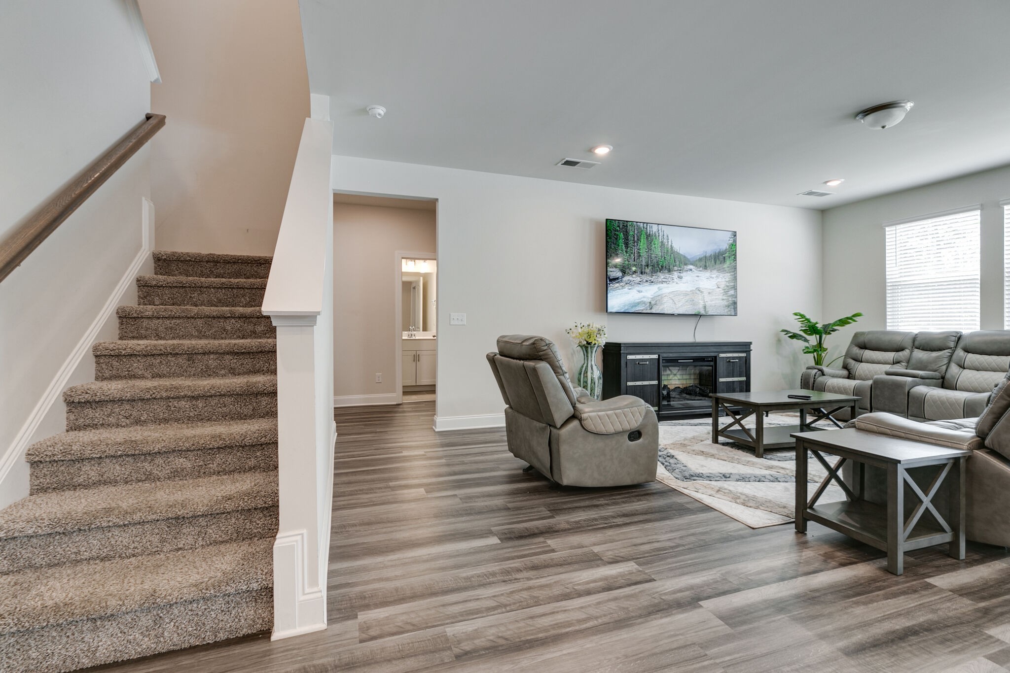 3264 Longstalk Road Antioch, TN 37013 - Photo 17 of 49 a living room with furniture and wooden floor