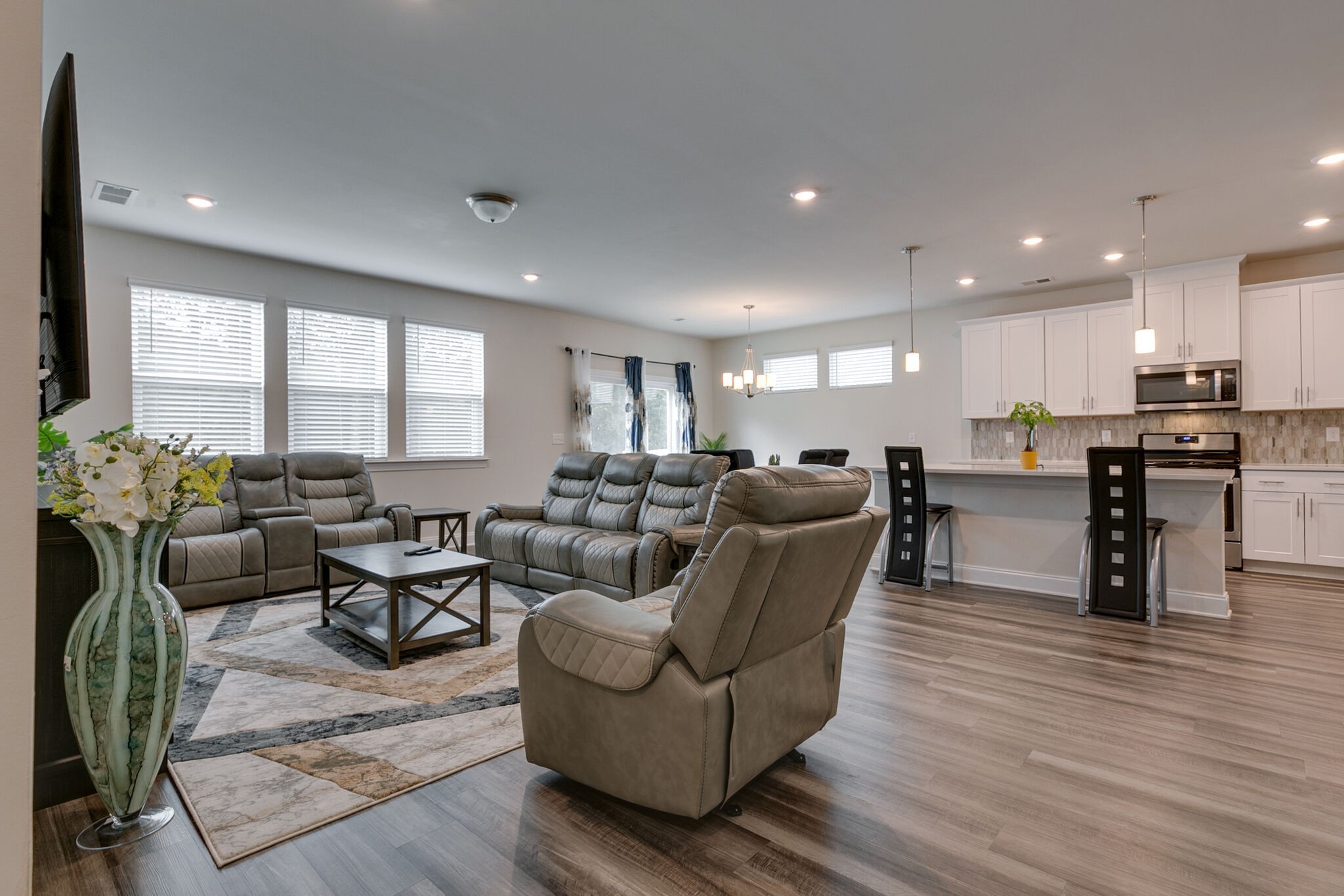 3264 Longstalk Road Antioch, TN 37013 - Photo 18 of 49 a living room kitchen with furniture and a wooden floor