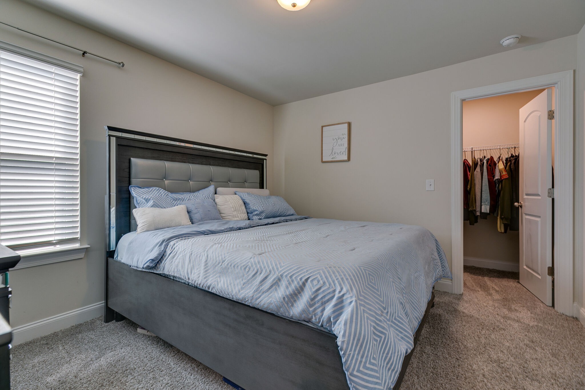 3264 Longstalk Road Antioch, TN 37013 - Photo 19 of 49 a bedroom with a bed and a window