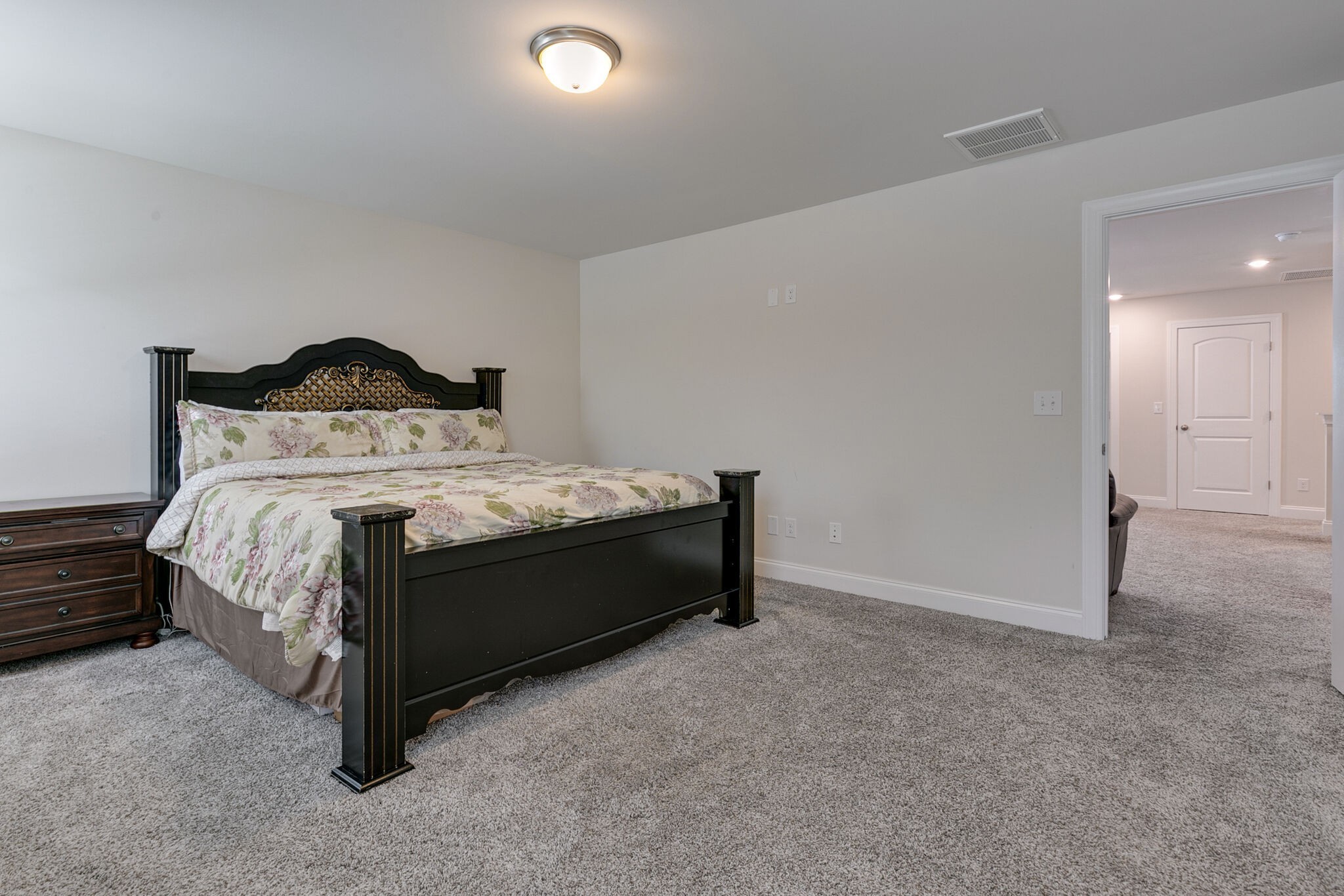 3264 Longstalk Road Antioch, TN 37013 - Photo 29 of 49 a bedroom with a bed and a lamp