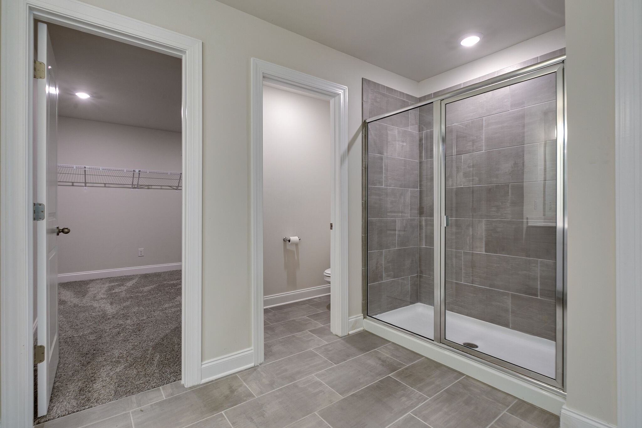 3264 Longstalk Road Antioch, TN 37013 - Photo 32 of 49 a bathroom with a glass shower door