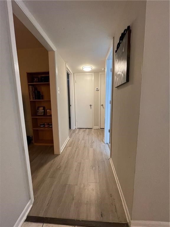 4302 Lake Road, Unit 4 Killeen, TX 76543 - Photo 5 of 9 Corridor with light wood-type flooring