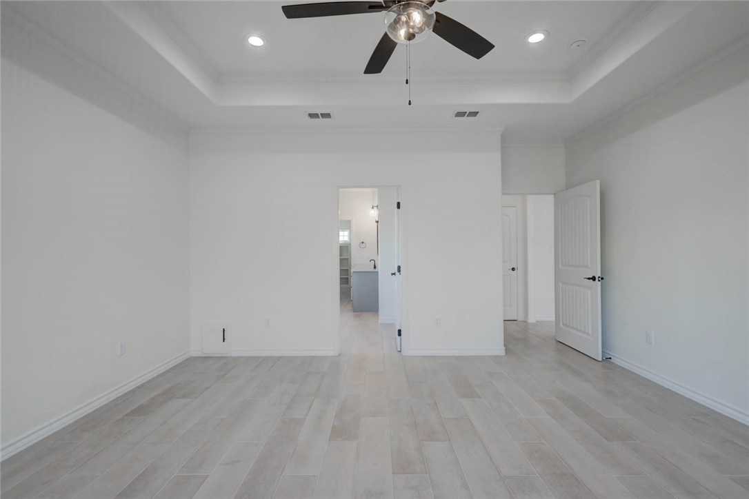 141 Amethyst Street Portland, TX 78374 - Photo 12 of 22 wooden floor in an empty room