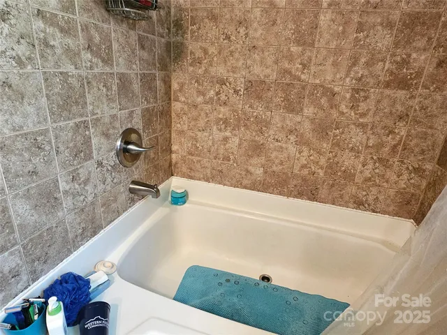 a bathroom with a bathtub