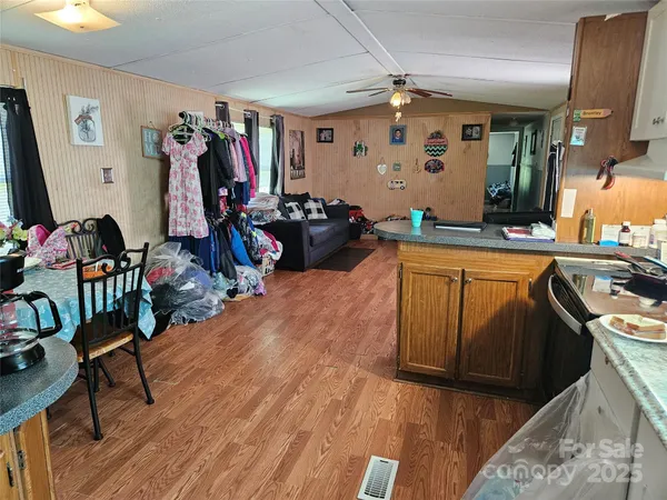 a bathroom with a sink vanity mirror and toilet