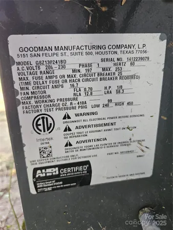 a kitchen with a stove a refrigerator and a table