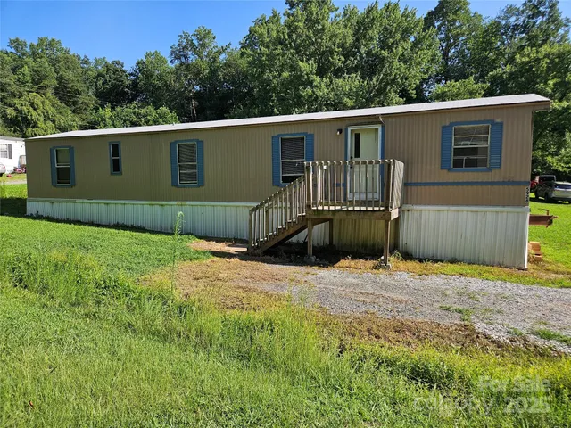 a house view with a backyard space