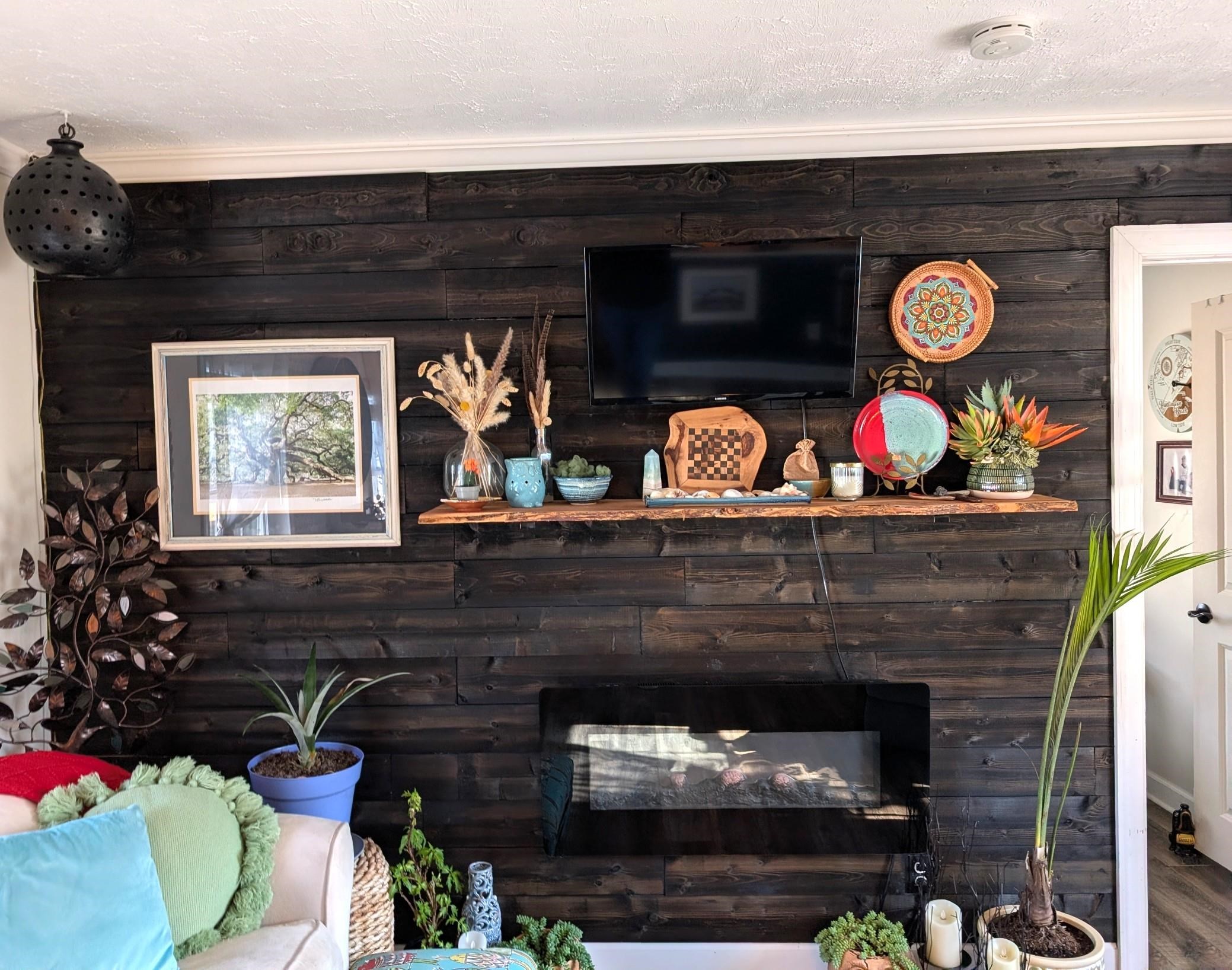 3 Poolside Drive Murrells Inlet, SC 29576 - Photo 14 of 40 Detailed view of a fireplace, a textured ceiling, and crown molding