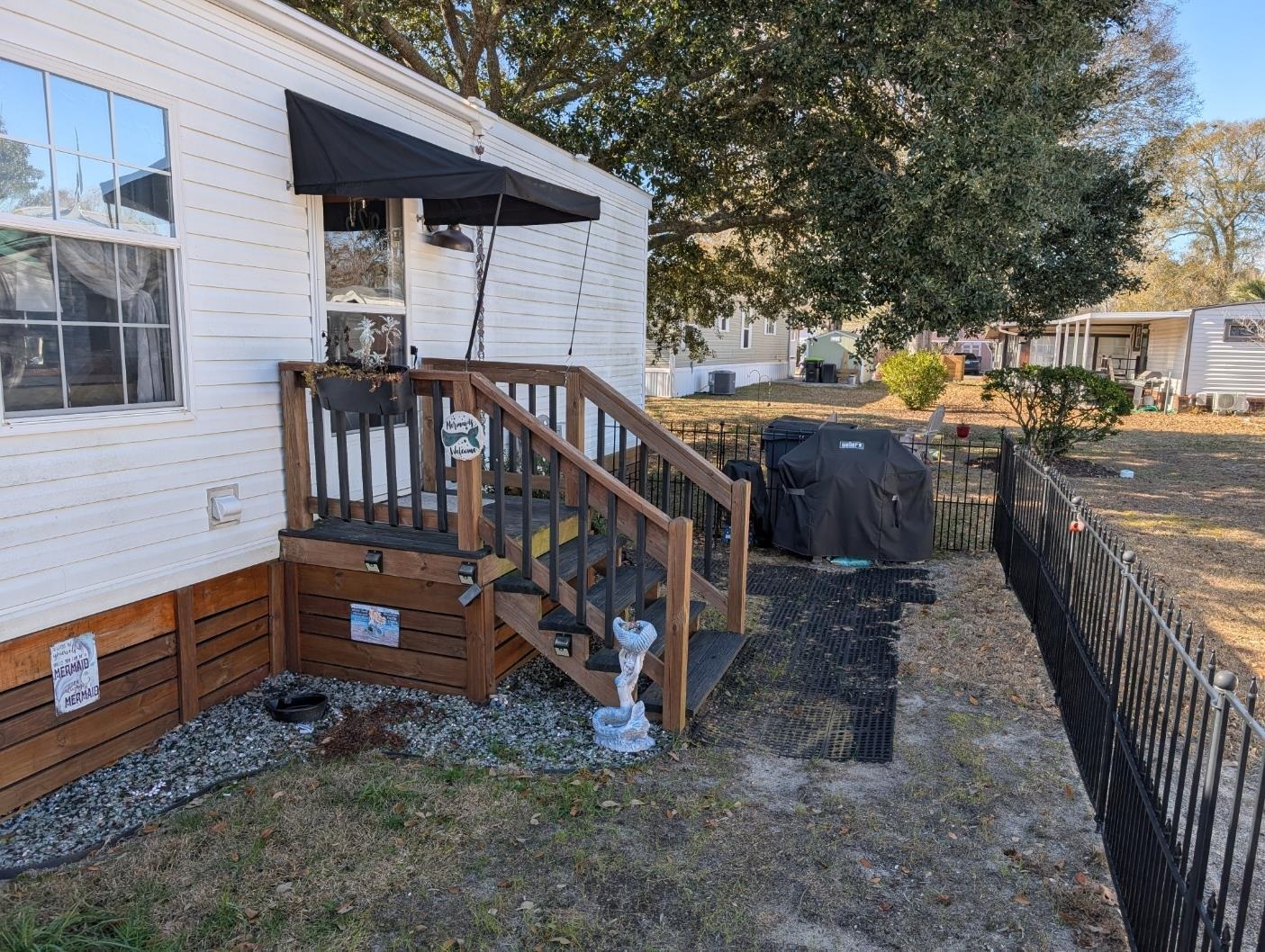3 Poolside Drive Murrells Inlet, SC 29576 - Photo 23 of 40 View of fenced backyard