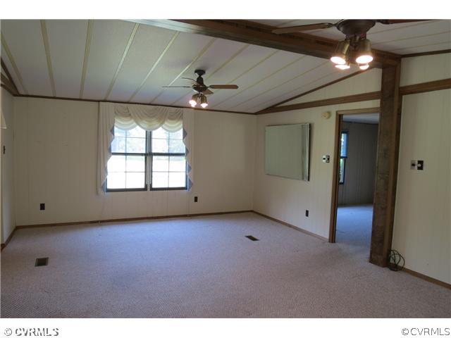 172 Callis Wharf Road Hudgins, VA 23076 - Photo 5 of 8 Living Room - Living room views toward the other s