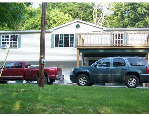 Exterior Front. Country setting for you and this 10 years young home!