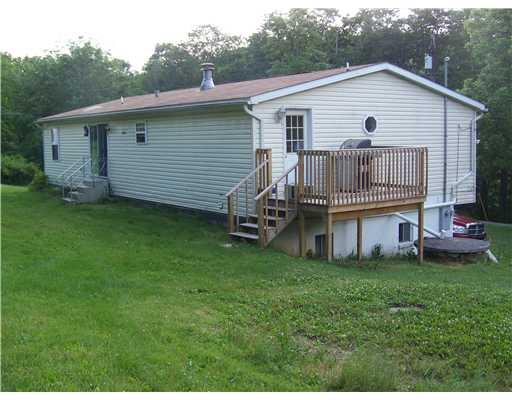126 Kusch Road Scenery Hill, PA 15360 - Photo 18 of 18 Exterior Back. Property has a well and cistern.