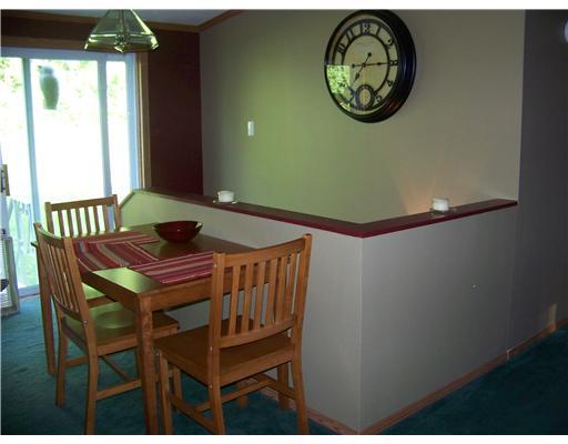 Dining Room. Quaint dining area off of L-shaped kitchen.