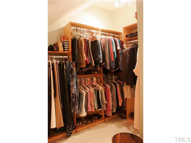 801 Brookfield Road Raleigh, NC 27615 - Photo 14 of 17 a view of walk in closet with clothes