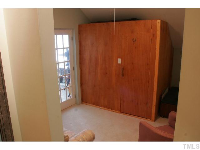801 Brookfield Road Raleigh, NC 27615 - Photo 15 of 17 a view of an empty room with windows