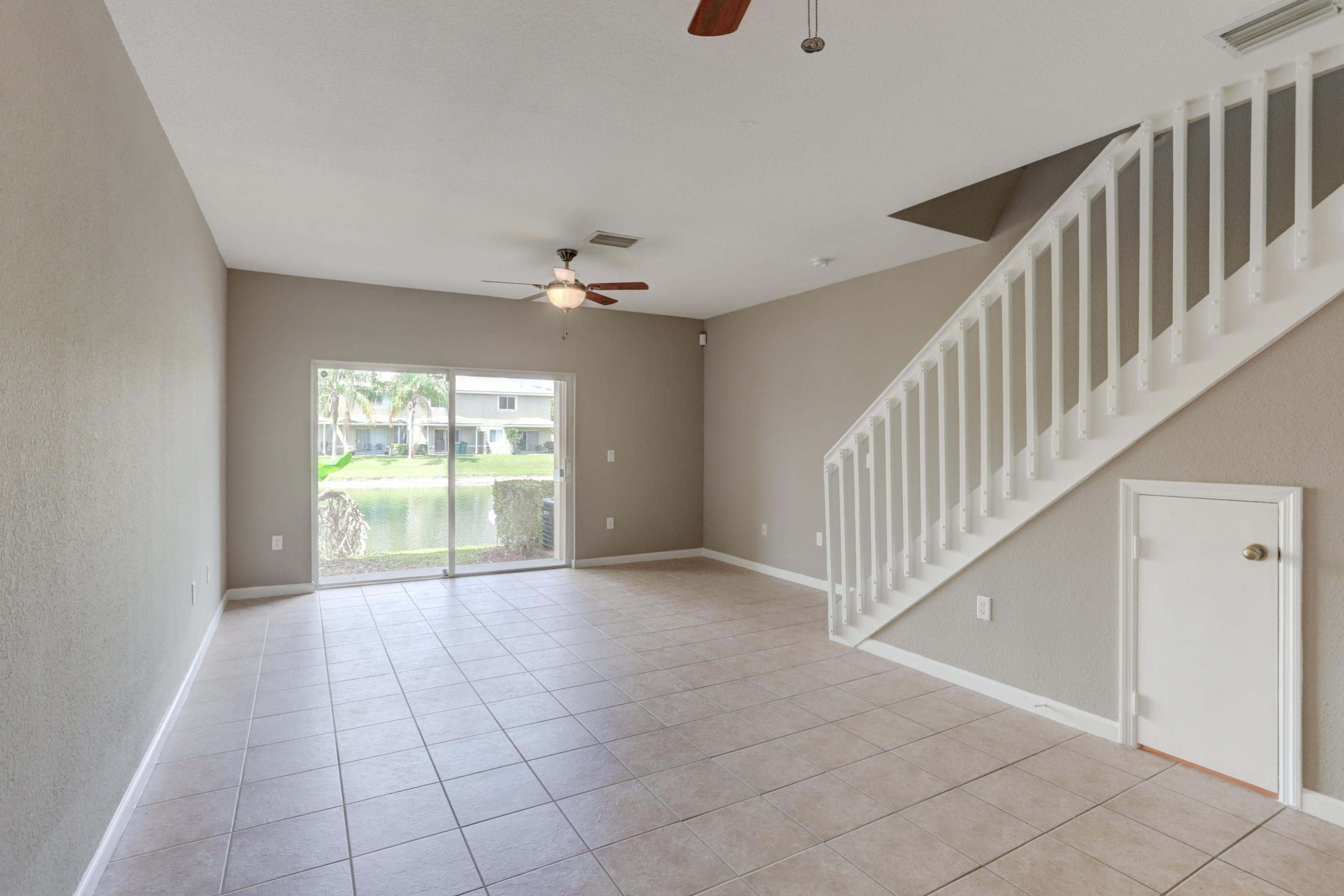 5909 Riverside Avenue Tamarac, FL 33321 - Photo 2 of 32 a view of an empty room with a window