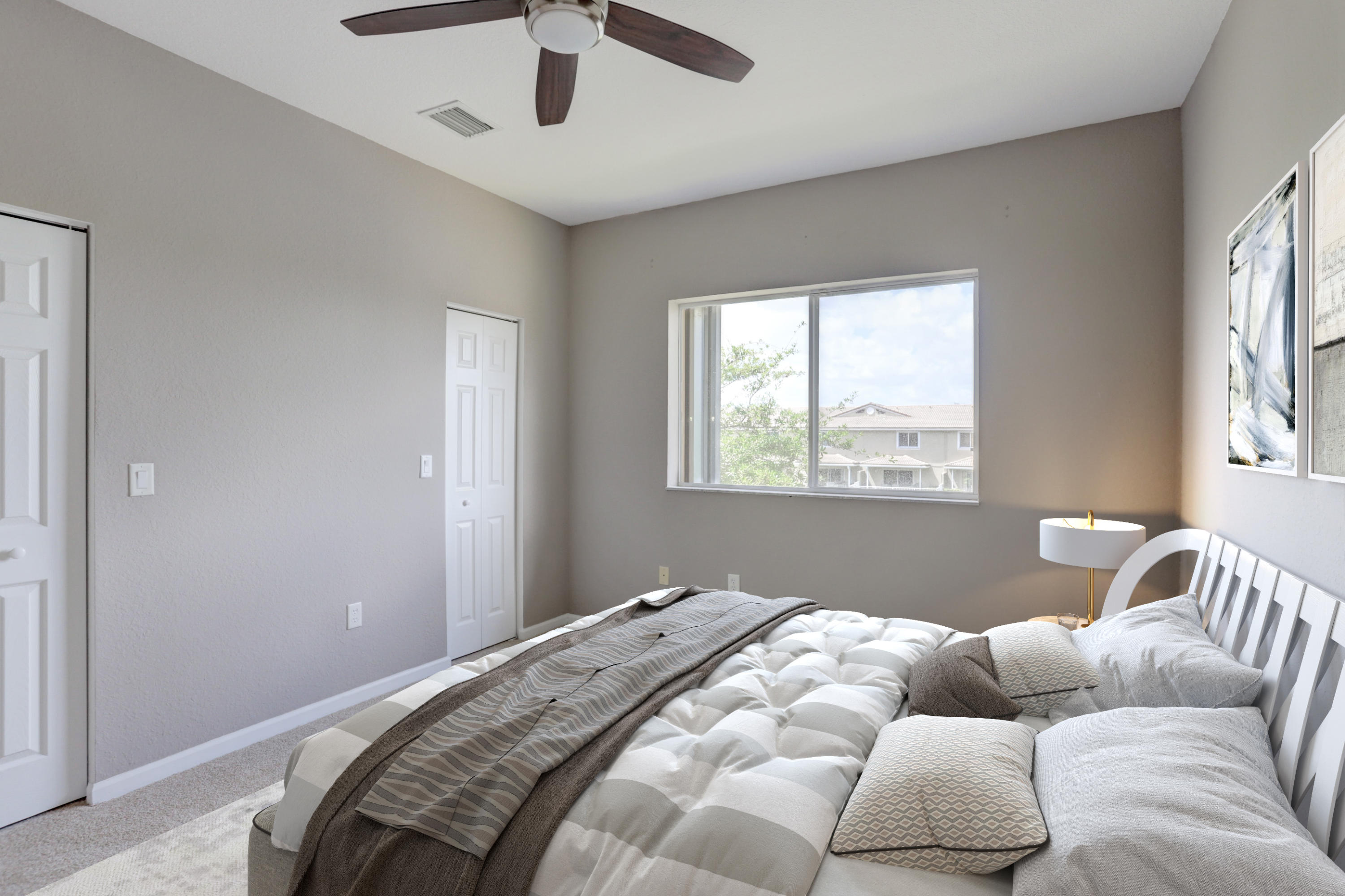 5909 Riverside Avenue Tamarac, FL 33321 - Photo 7 of 32 a bedroom with bed and a window