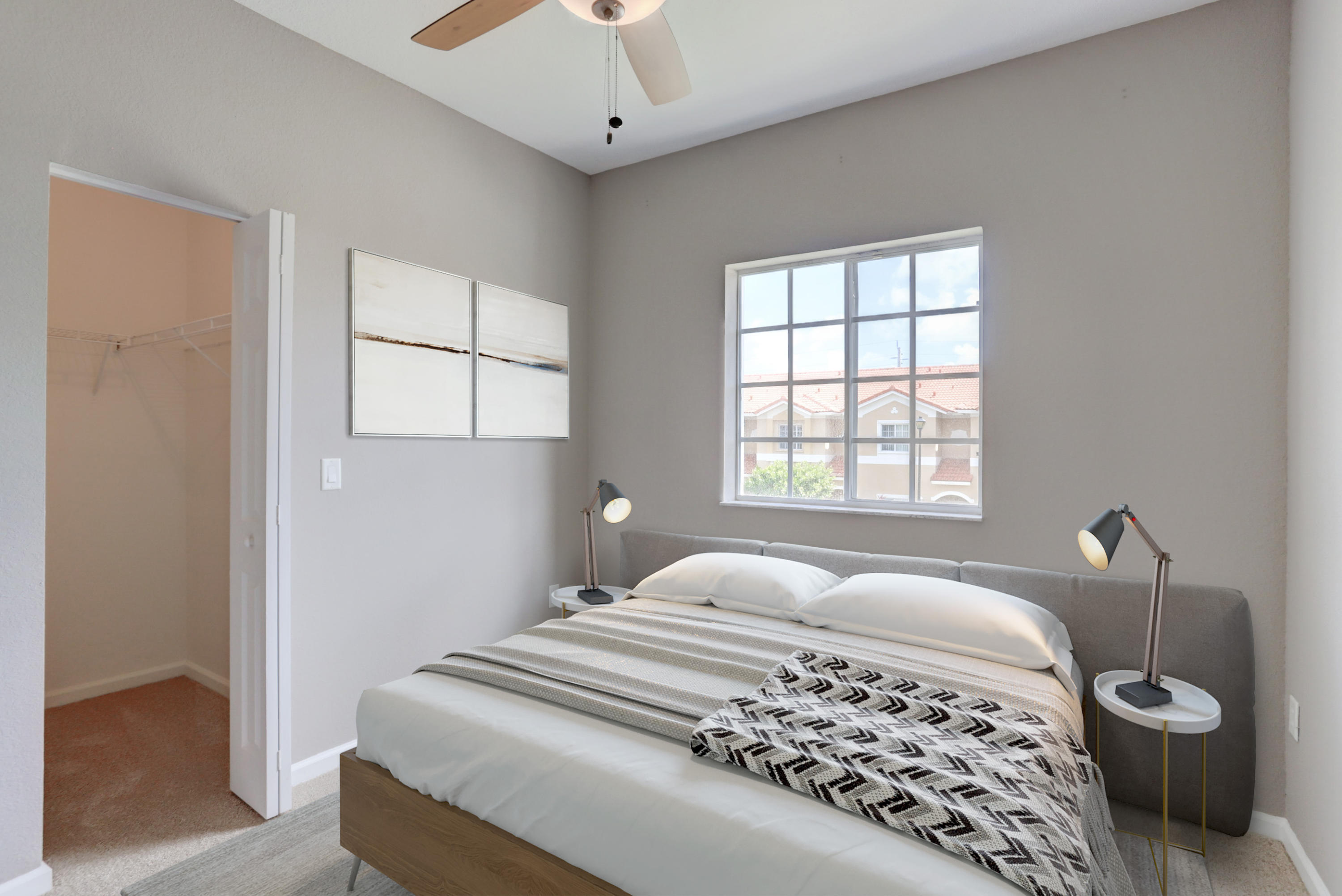 5909 Riverside Avenue Tamarac, FL 33321 - Photo 9 of 32 a bedroom with a bed and a window