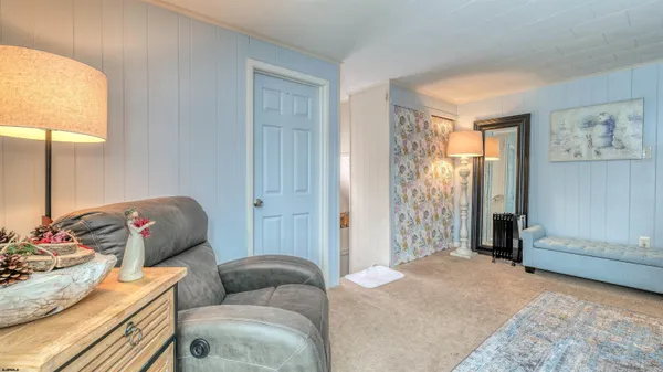 a bathroom with a sink toilet and mirror