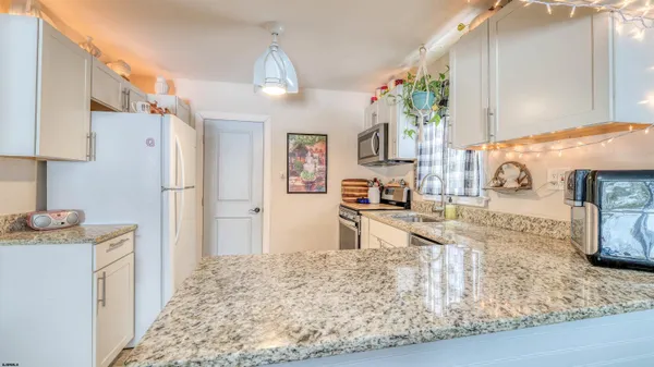a view of a kitchen and kitchen