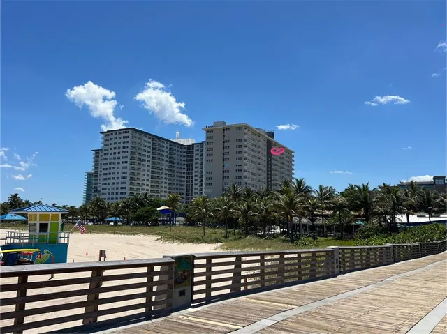 a view of building and yard