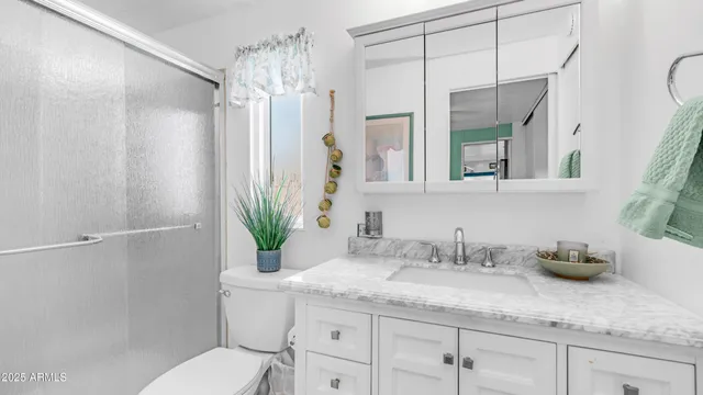 a bathroom with a shower curtain