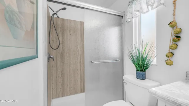 a building outdoor space with patio furniture and potted plants