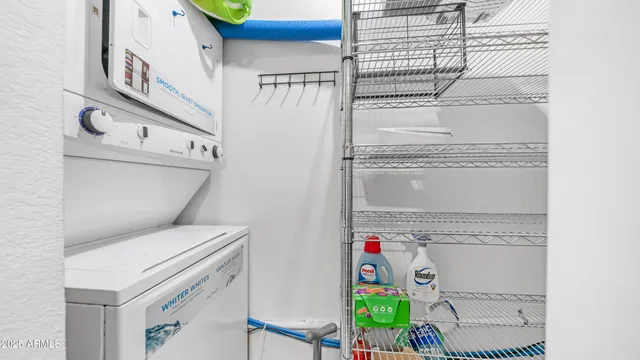 a view of a backyard with sitting area