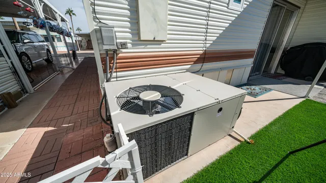 a front view of a building with outdoor seating