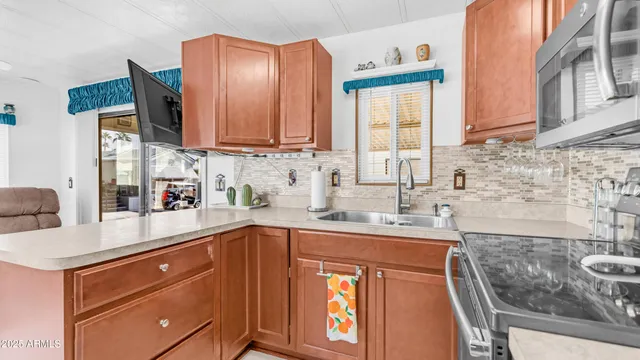 a dining room with furniture wooden floor and a window