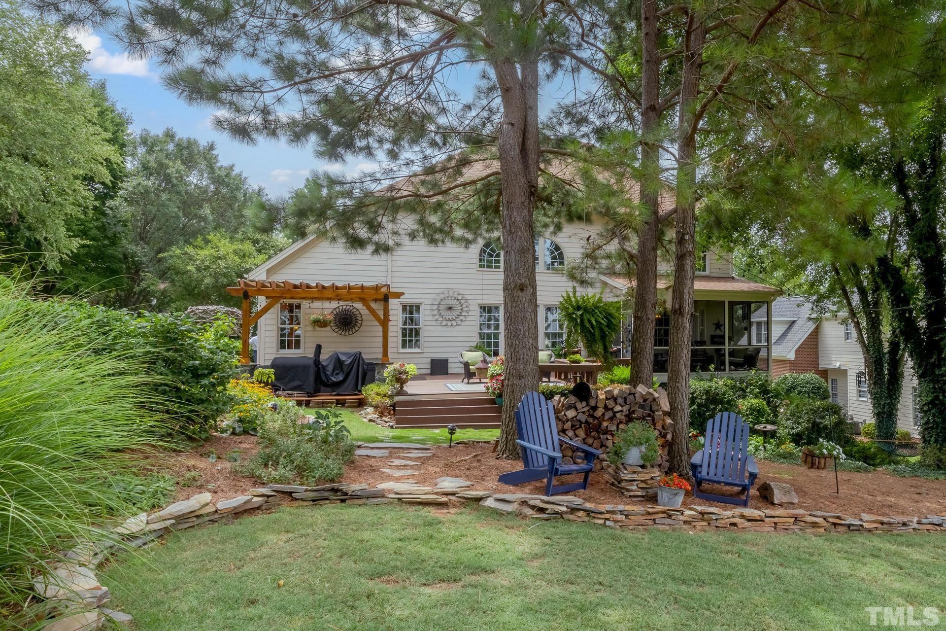 108 Challenge Road Raleigh, NC 27603 - Photo 54 of 60 a view of a house with backyard