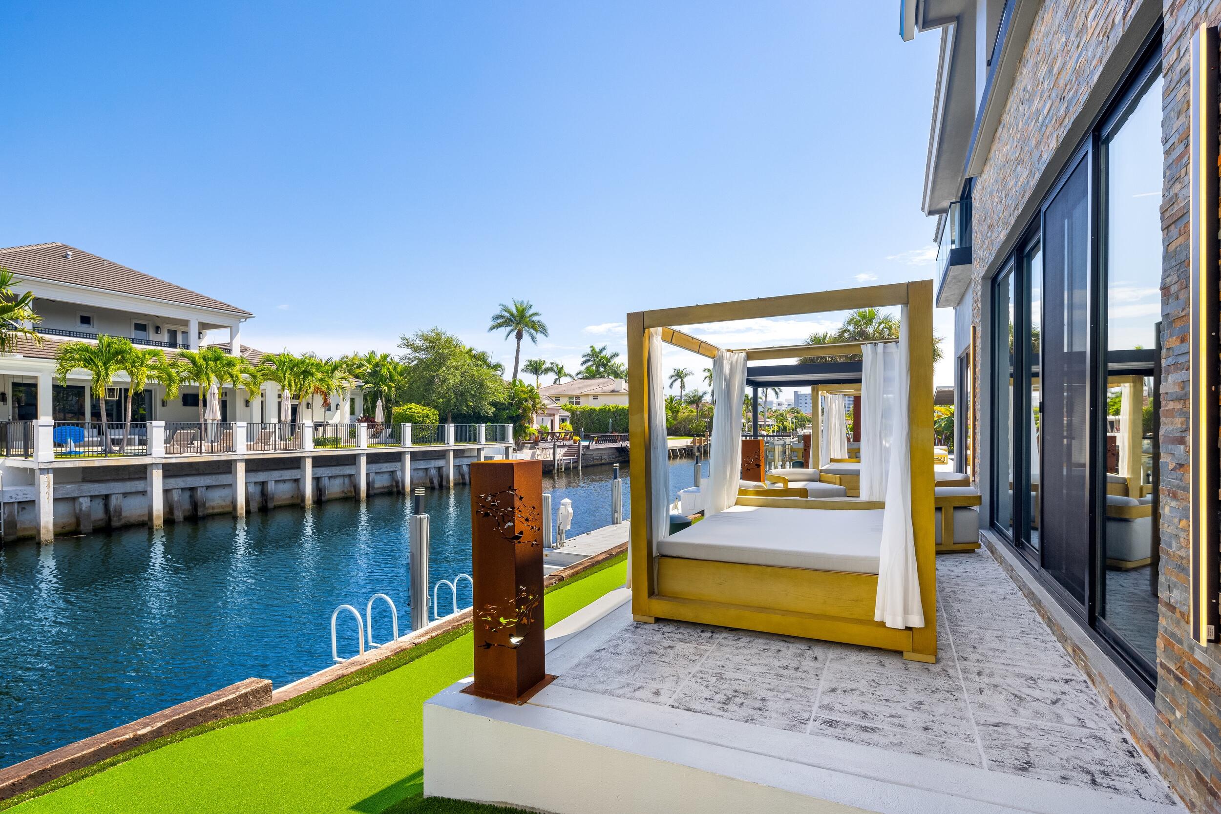 839 Northeast Bay Isle Drive Boca Raton, FL 33487 - Photo 102 of 103 a view of swimming pool with outdoor seating