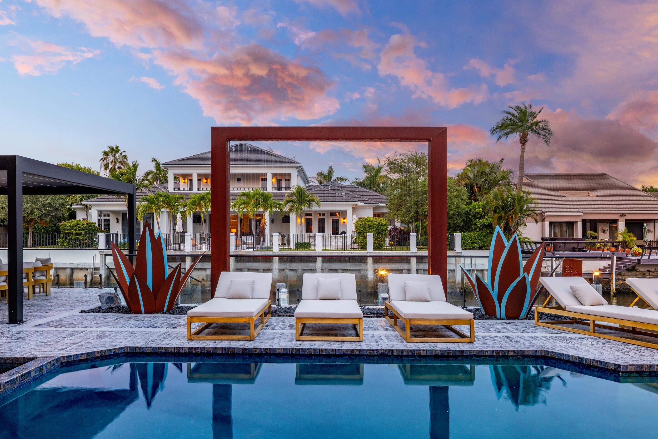 839 Northeast Bay Isle Drive Boca Raton, FL 33487 - Photo 13 of 103 a view of a dinning room with furniture and floor to ceiling window