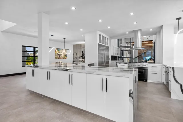 a view of outdoor space with wooden floor and barbeque oven