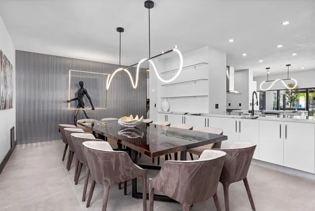 a bathroom with a sink a mirror and a shower