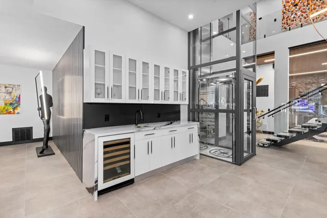 a bedroom with furniture and a wooden floor