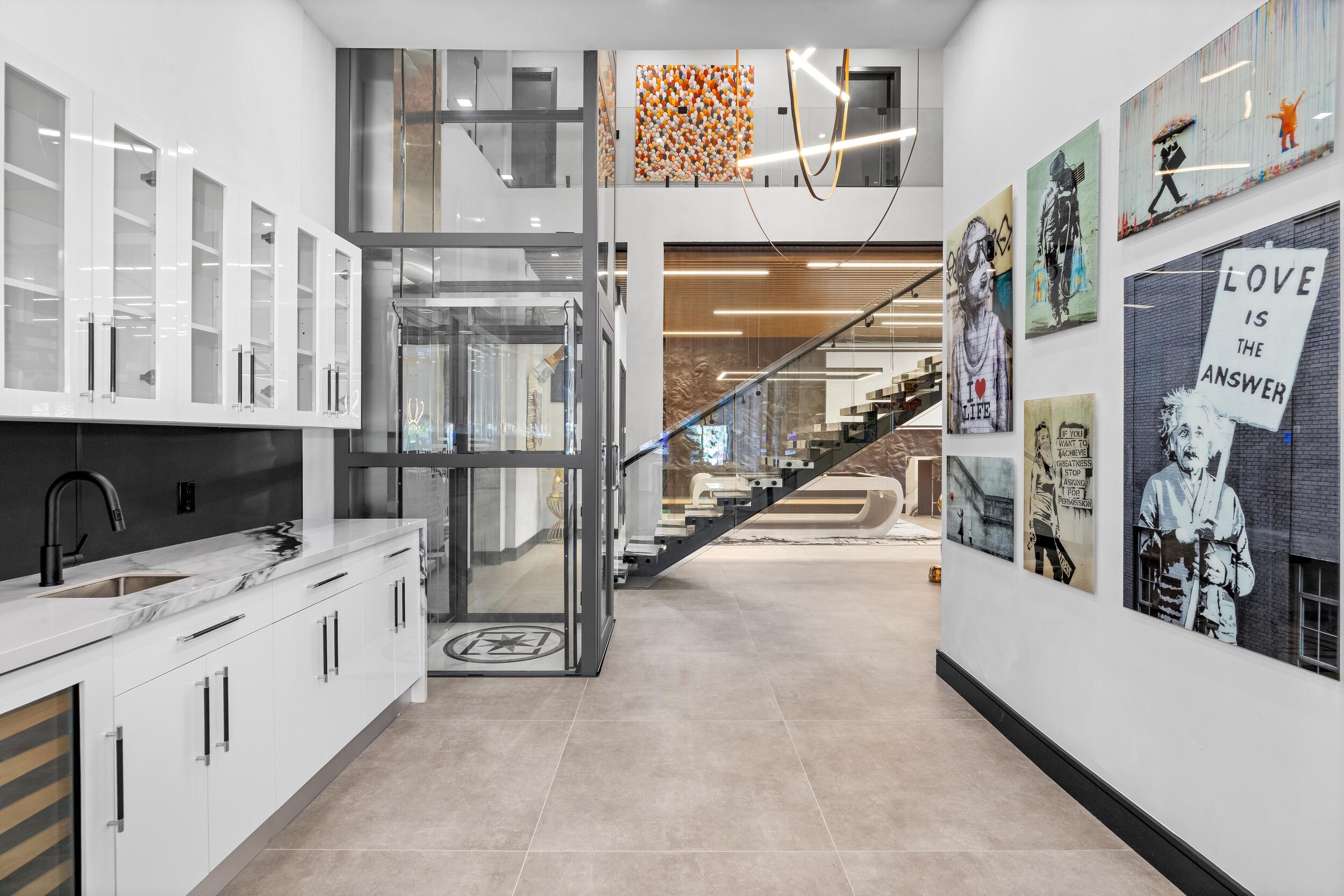 839 Northeast Bay Isle Drive Boca Raton, FL 33487 - Photo 29 of 103 a view of a bathroom with a sink and mirror