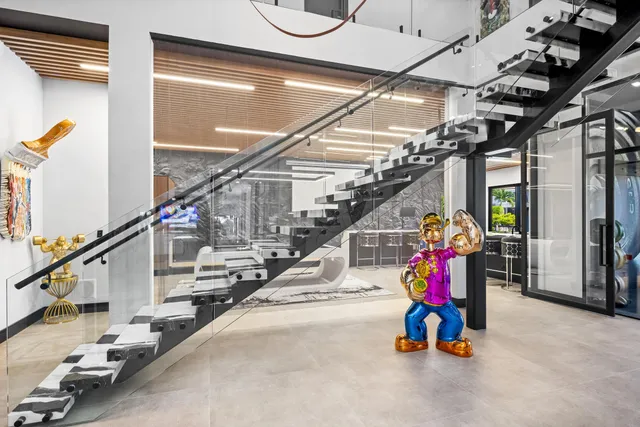 a view of a lake with a house swimming pool and outdoor space