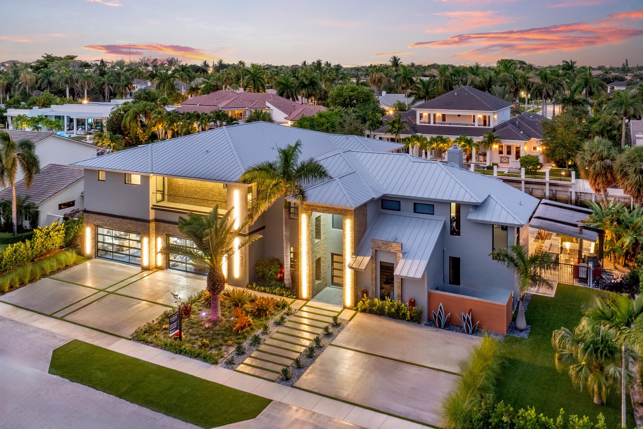 839 Northeast Bay Isle Drive Boca Raton, FL 33487 - Photo 3 of 103 an aerial view of a house