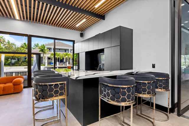 a bedroom with a bed couch and window