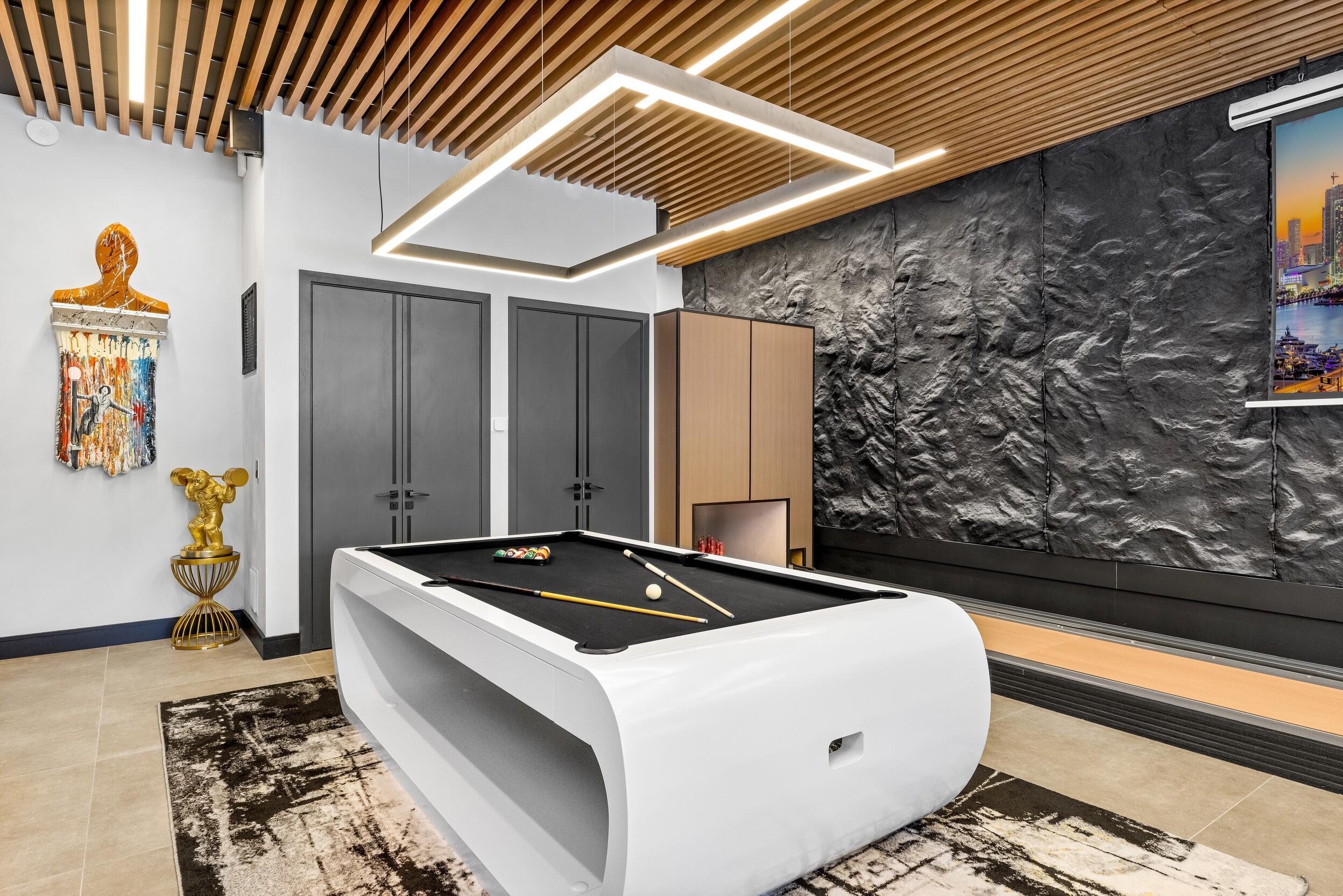 839 Northeast Bay Isle Drive Boca Raton, FL 33487 - Photo 37 of 103 a living room with a couch and a table